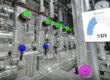 Technical pipe systems with color-coded components and a digital overlay of a pressure display with a value of 0.829 ("relative pressure").