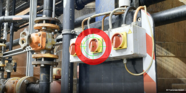 Framence_Blog_PoN_erstellen_suchen_bearbeiten Industrial switch system with three red rotary switches in yellow housings, mounted on a black bracket; the middle switch is marked with a digital green crosshair and red target circle.
