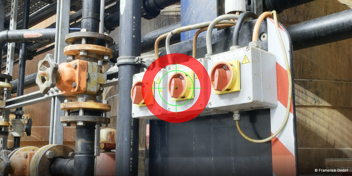 Framence_Blog_PoN_erstellen_suchen_bearbeiten Industrial switch system with three red rotary switches in yellow housings, mounted on a black bracket; the middle switch is marked with a digital green crosshair and red target circle.